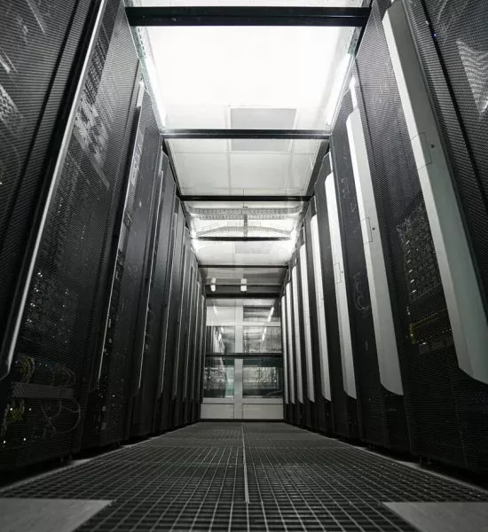 DC Cooling Image (1) A cooling system in a data center, showcasing air conditioning units and ventilation designed to regulate temperature.