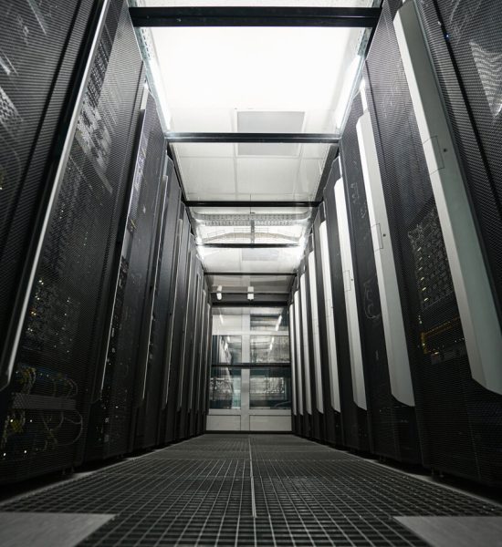 A cooling system in a data center, showcasing air conditioning units and ventilation designed to regulate temperature.